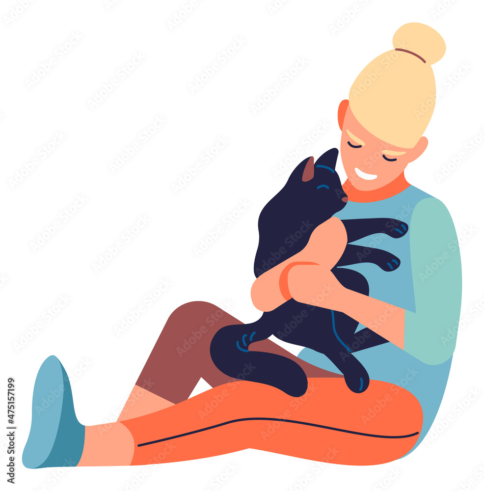 Girl cuddle cat. Young woman holding kitten. Person playing with pet Girl cuddle cat. Young woman holding kitten. Person playing with pet