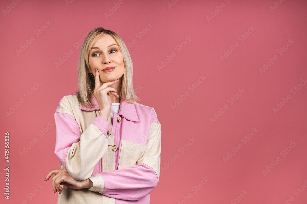 Portrait of a young beautiful cute cheerful blonde woman smiling isolated over pink background. Portrait of a young beautiful cute cheerful blonde woman smiling isolated over pink background.