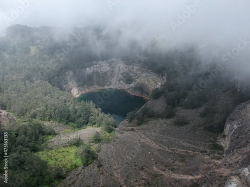 The Kelimutu volcanic crater lakes in Ende, East Nusa Tenggara, Indonesia, are situated at 1,400 masl. The water in the lakes is known to mysteriously change colour.  photo