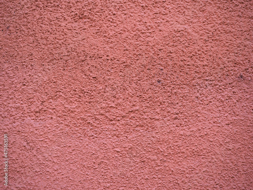 red plaster wall background
