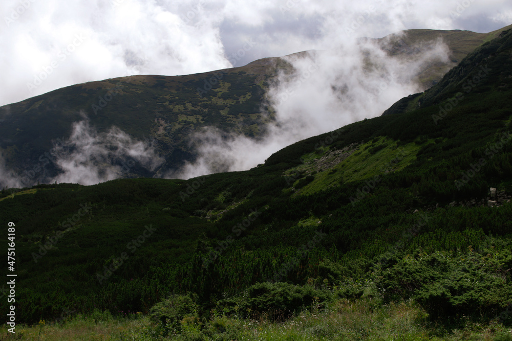 clouds in the mountains clouds in the mountains