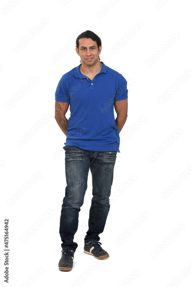 front view of a man with long hair and tattoo looking at camera on white background front view of a man with long hair and tattoo looking at camera on white background