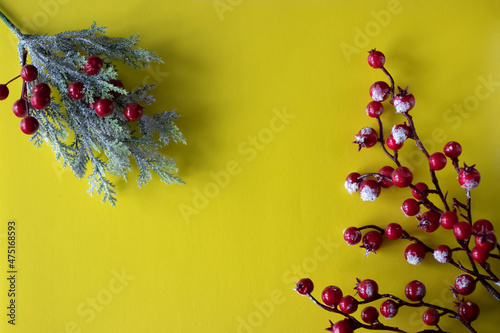 Christmas decor on yellow background. Christmas and New Year concept. Soft focus.