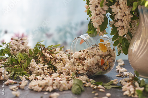 Acacia flowers in glass bowl on a table