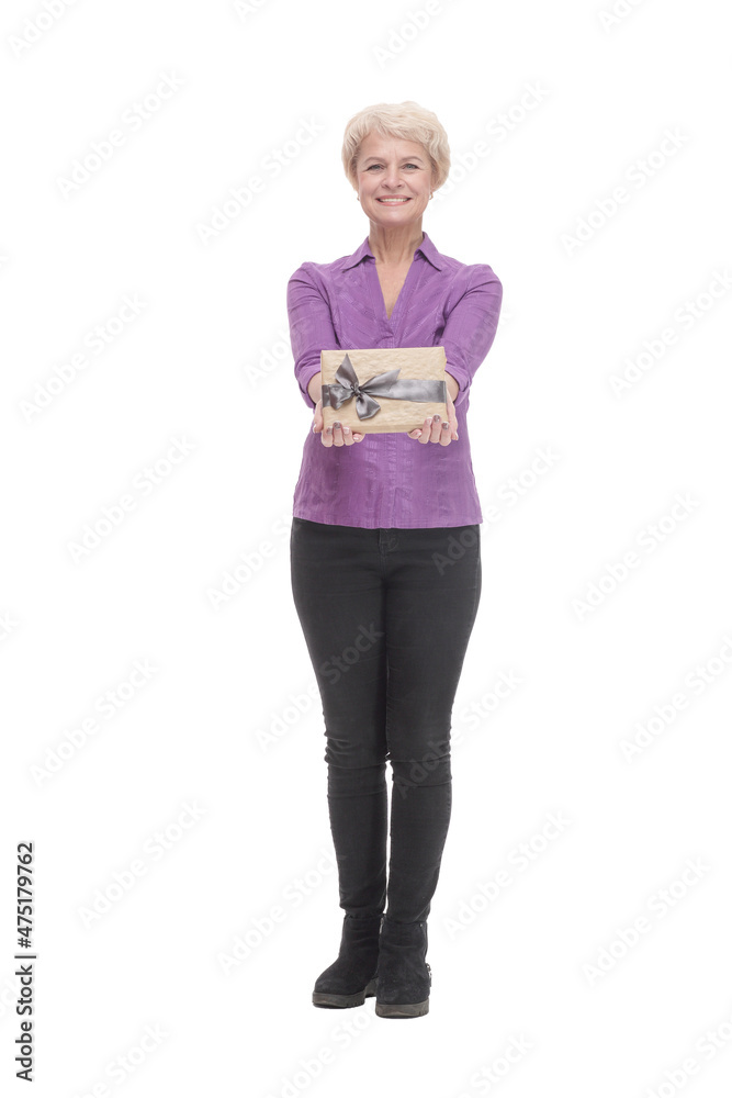in full growth. happy mature woman with gift box.