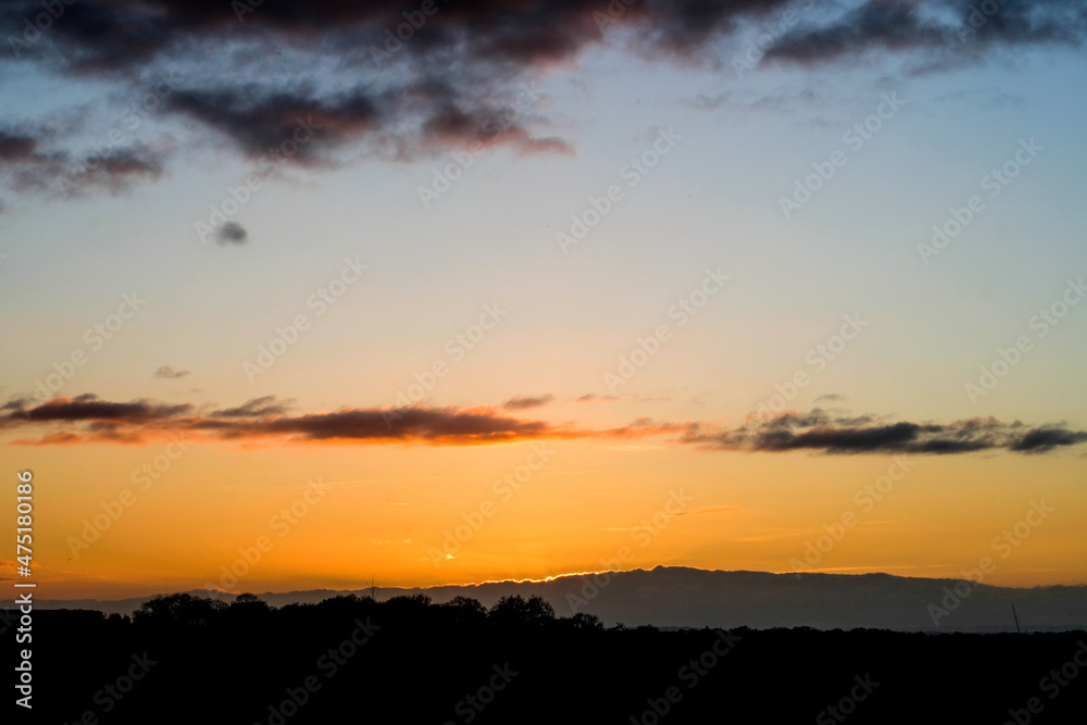 Winter sunset sky with wispy clouds Winter sunset sky with wispy clouds