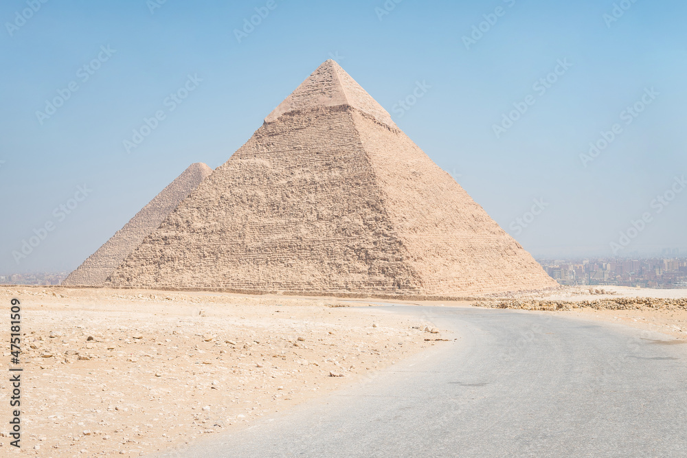 landscape of giza plateau with pyramids at background landscape of giza plateau with pyramids at background