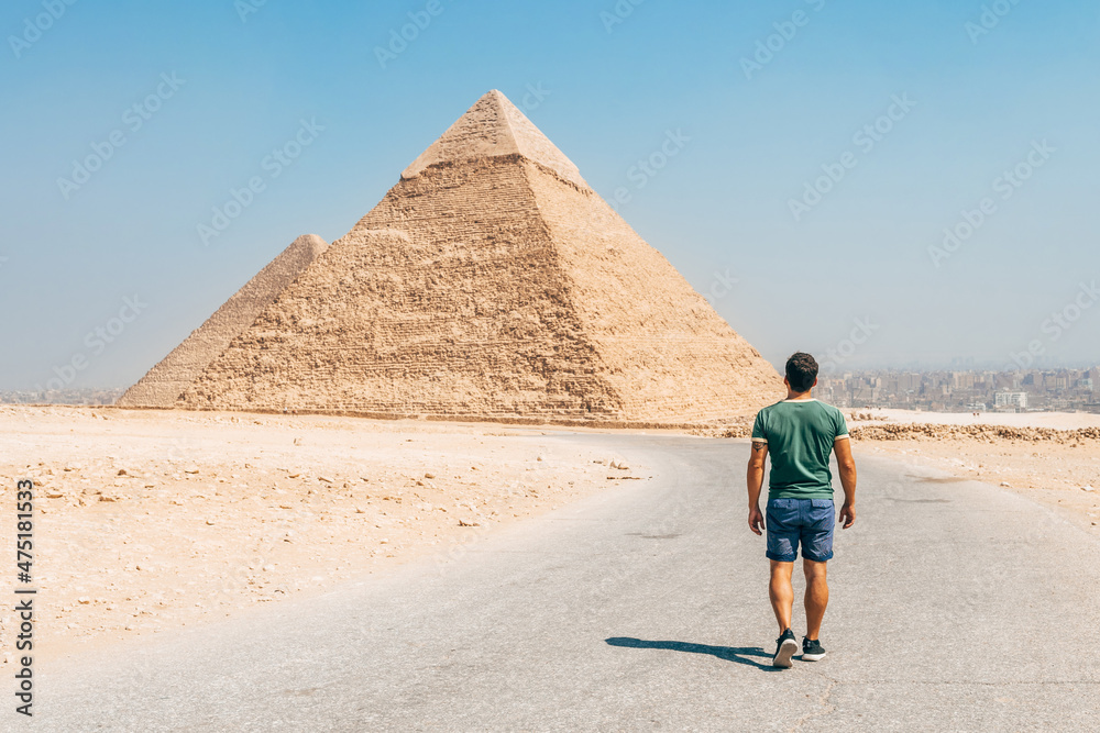 landscape of giza plateau with pyramids at background - obrazy, fototapety, plakaty 