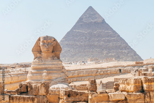sphinx monument with pyramids at background  egypt