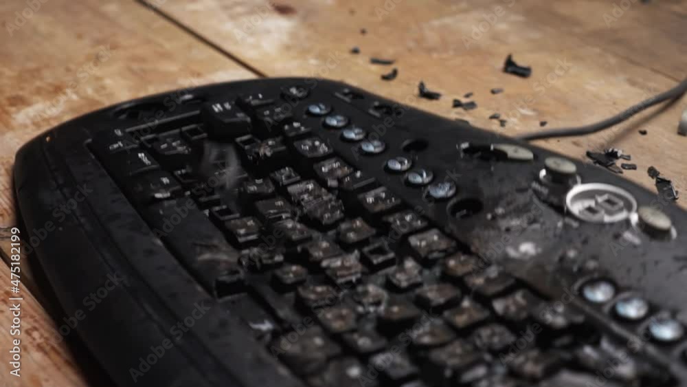 Hammer hitting computer keyboard. Damage keyboard. Broken office ...