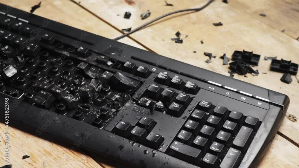 Hammer hitting computer keyboard. Damage keyboard. Broken office ...