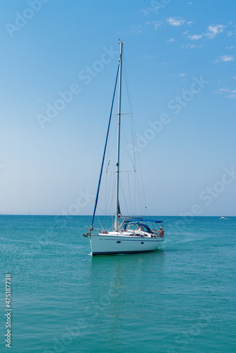 Small yacht sailing in a sea