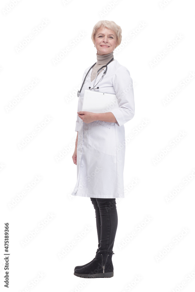 in full growth. modern woman doctor with a digital tablet .