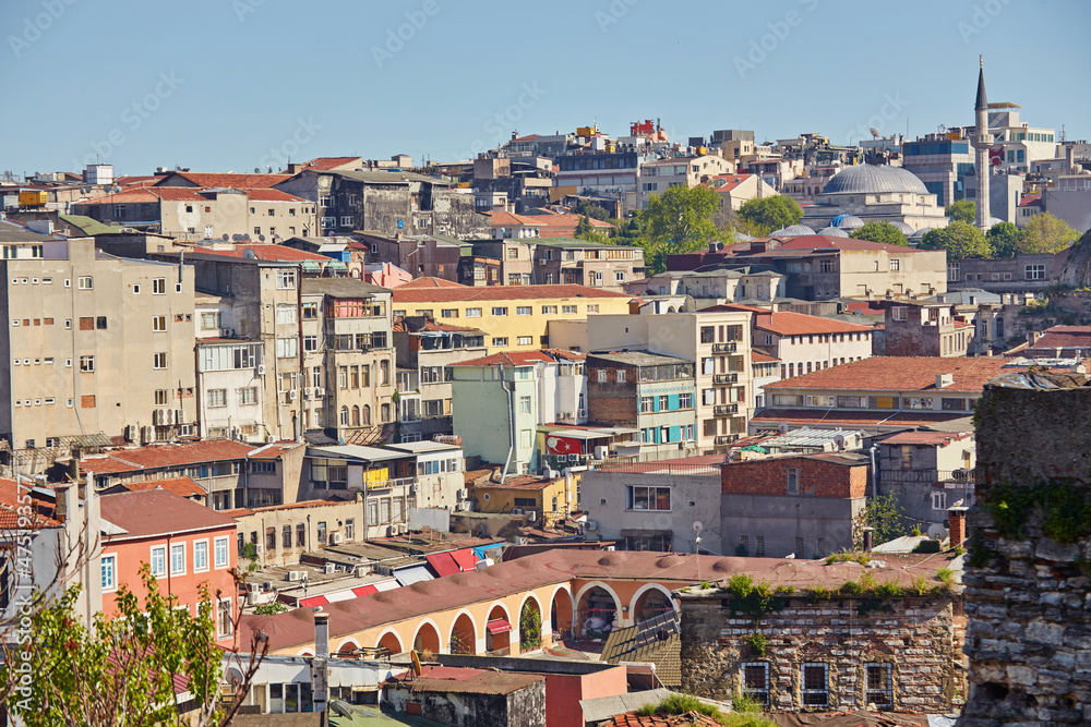 Astonishing view of Istanbul. Beautiful view of historic center of Istanbul. Rainy morning landscape. Roofs of buildings and minarets of mosque.