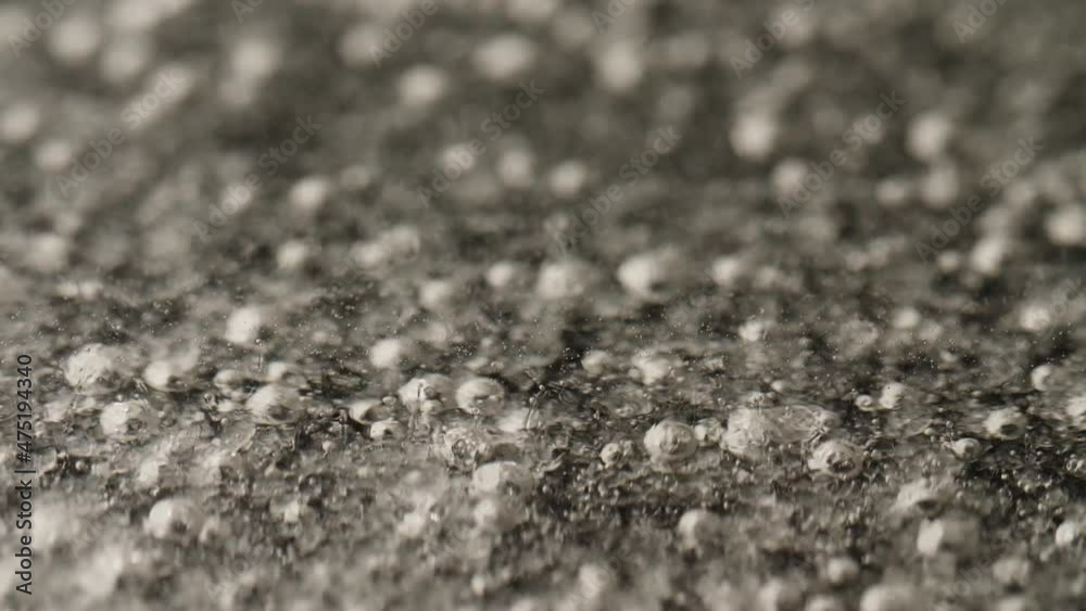 Macro shot of bubbles in viscous clear boiling substance, shallow depth of field. Macro shot of bubbles in viscous clear boiling substance, shallow depth of field.