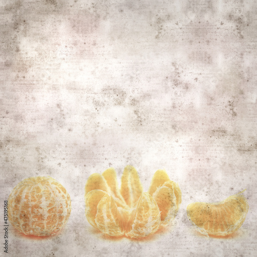 square stylish old textured paper background with small ripe satsuma mandarin
 photo