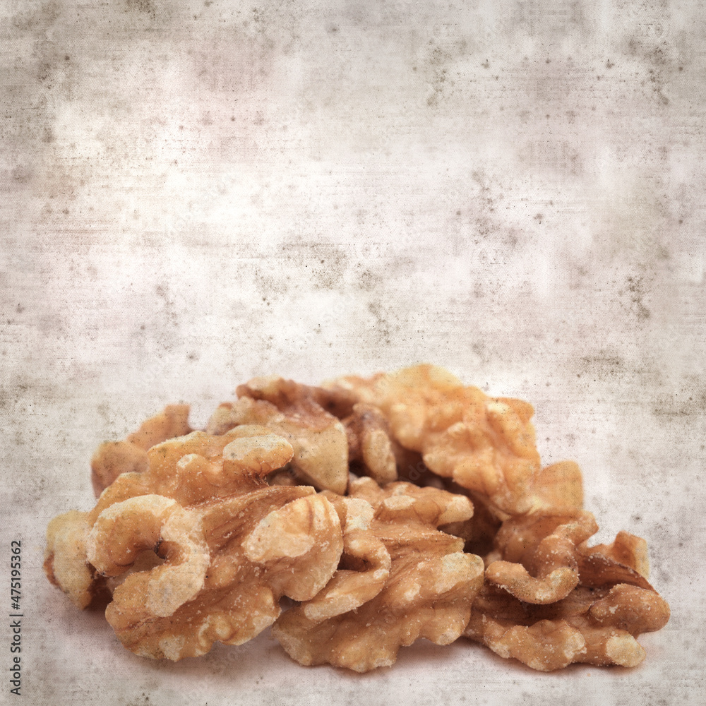 square stylish old textured paper background with walnuts from Gran Canaria square stylish old textured paper background with walnuts from Gran Canaria