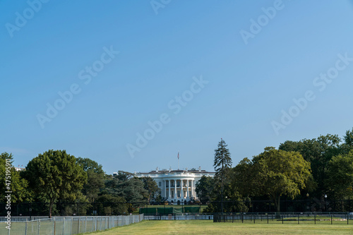 The iconic view on The White House on sunny day, Washington DC, USA. The concept of executive branch of American political system. President administration.
