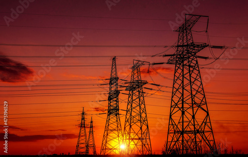  high-voltage power lines at sunset.