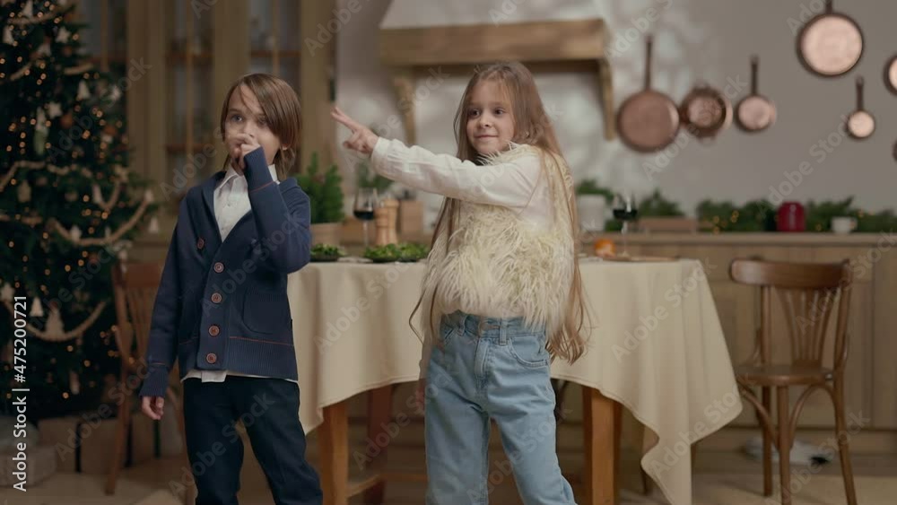 New Year. Kids Having Fun. Girl With Long Hair And Boy Dancing. New Year. Kids Having Fun. Girl With Long Hair And Boy Dancing.