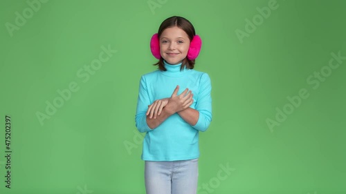 Low autumn temperature child tremble warm isolated green color background