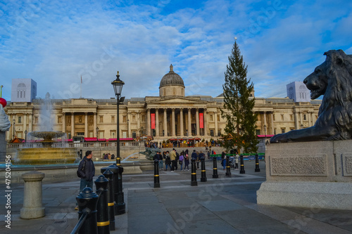 UK, London, 11.12.2021: Trafalgar Square. View to the The National Gallery. Winter, Christmas tree almost ready for holiday season  © Delia_Suvari
