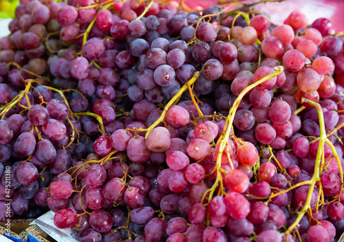 Bunches of ripe organic red grape for sale in the product store