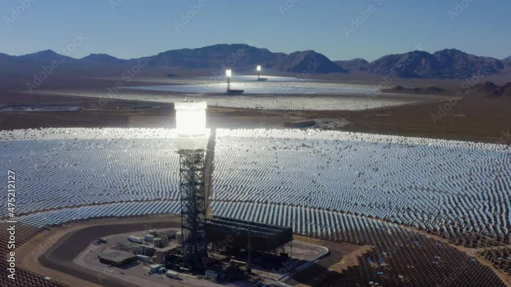 Aerial view of Ivanpah solar electric generating system near Las Vegas, NV - circling, drone shot