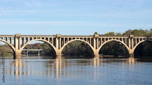 A 4k timelapse of the Fredericksburg Rail Bridge on a clear fall morning. photo