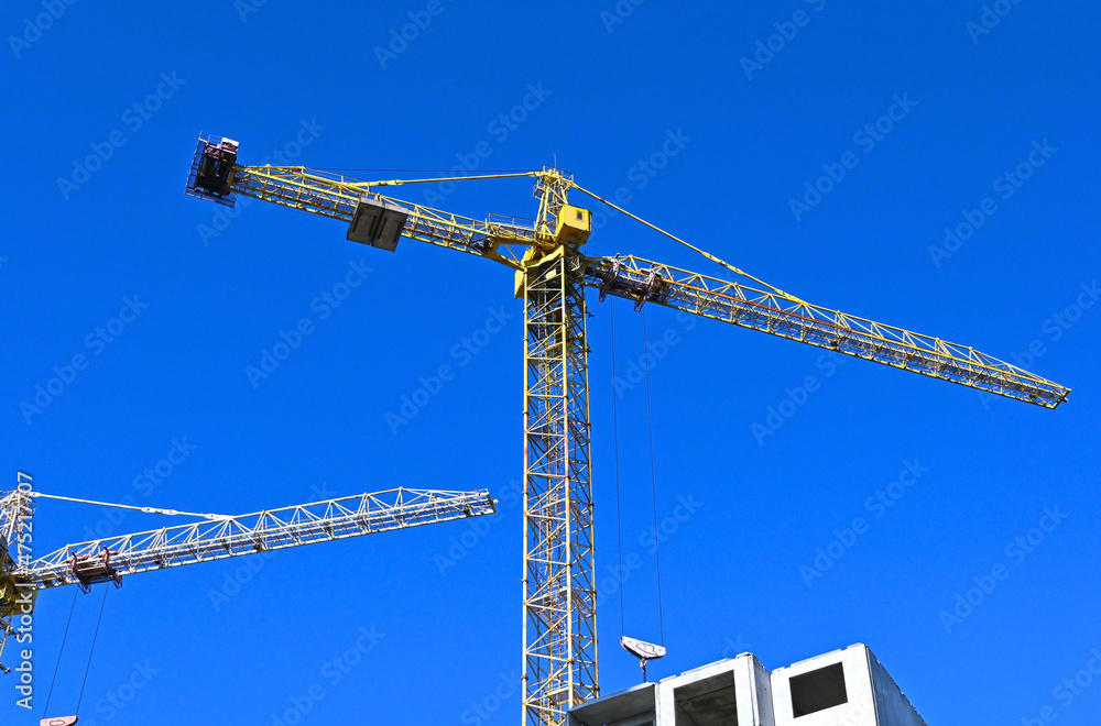 Crane and highrise construction site Crane and highrise construction site