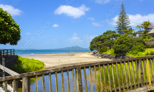 Landscape View of Mairangi Bay Beach Auckland, New Zealand; Place for Picnic and Relaxing; Rangitoto Island as a background