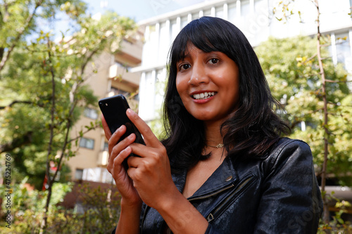 Asian woman using a smart phone