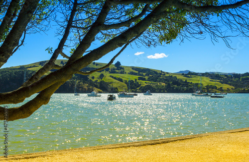 Panoramic View of Akaroa Beach on the Banks Peninsula, southeast of Christchurch, South Island, New Zealand.