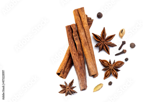 spice isolate. a set of spices for mulled wine. anise, cinnamon and cloves on a white table. spices for making a winter drink on a white background