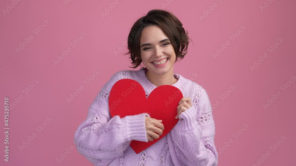Lovely lady show boyfriend amour gift cuddle isolated pastel color background Lovely lady show boyfriend amour gift cuddle isolated pastel color background