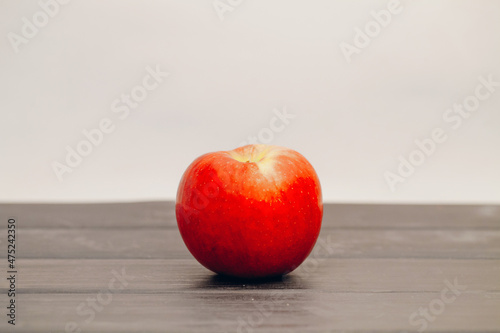 Fruit apples in a row on the table