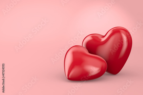 Two hearts on pink backgrou...