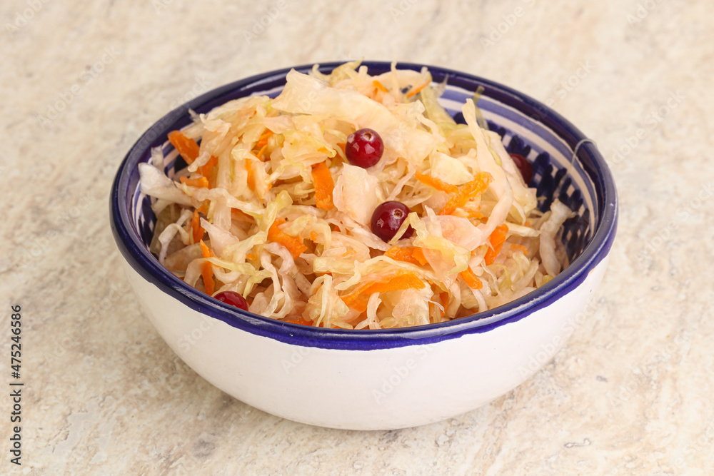 Fermented cabbage - sauerkraut in the bowl Fermented cabbage - sauerkraut in the bowl