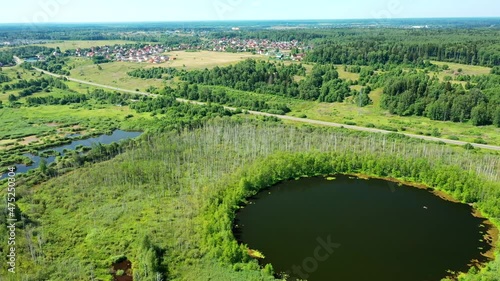 Aerial view of Bottomless  Lake in forest of Solnechnogorsk District, Moscow region. Russia. Aerial view. The lake is perfectly round and its depth is not determined.