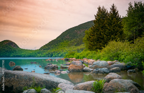 Wall Mural Beautiful view of a river and mountain forests at sunset in Arcadia National Par
