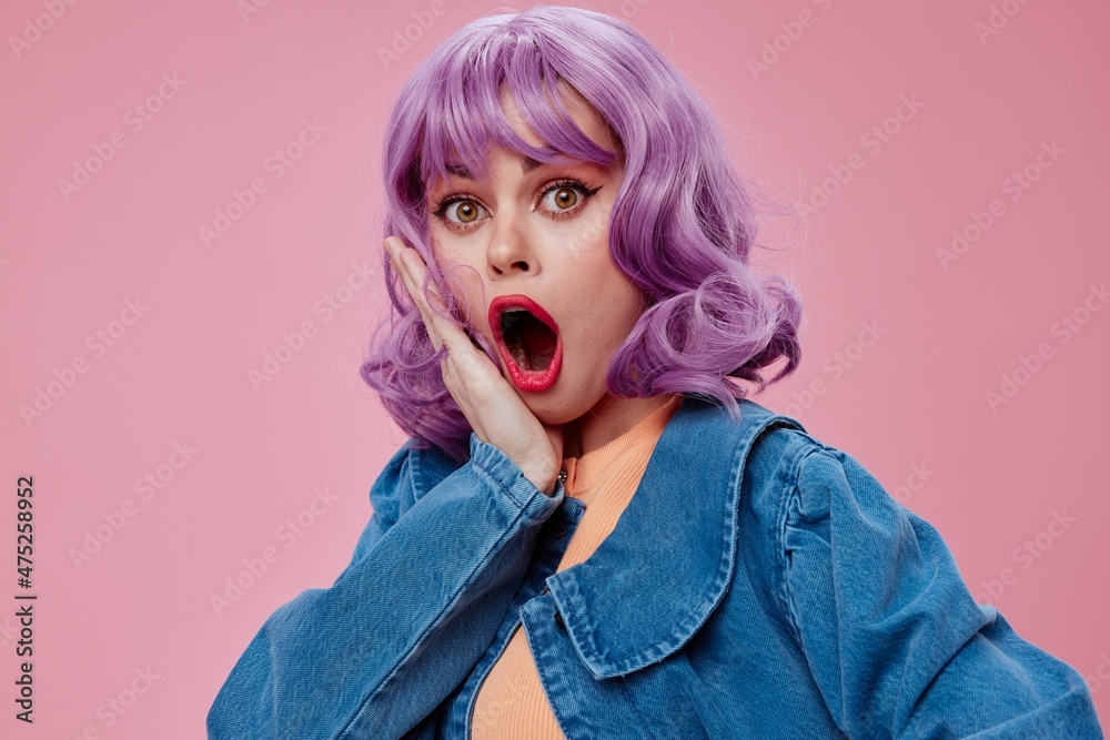 Portrait of a charming lady purple hair fashion posing glamor color background unaltered Portrait of a charming lady purple hair fashion posing glamor color background unaltered