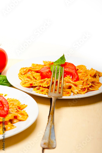 Italian pasta farfalle butterfly bow-tie and tomato sauce