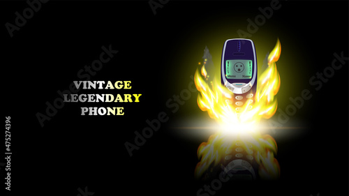 Vintage legendary push-button monochrome telephone in a bright flame on a black background with reflection