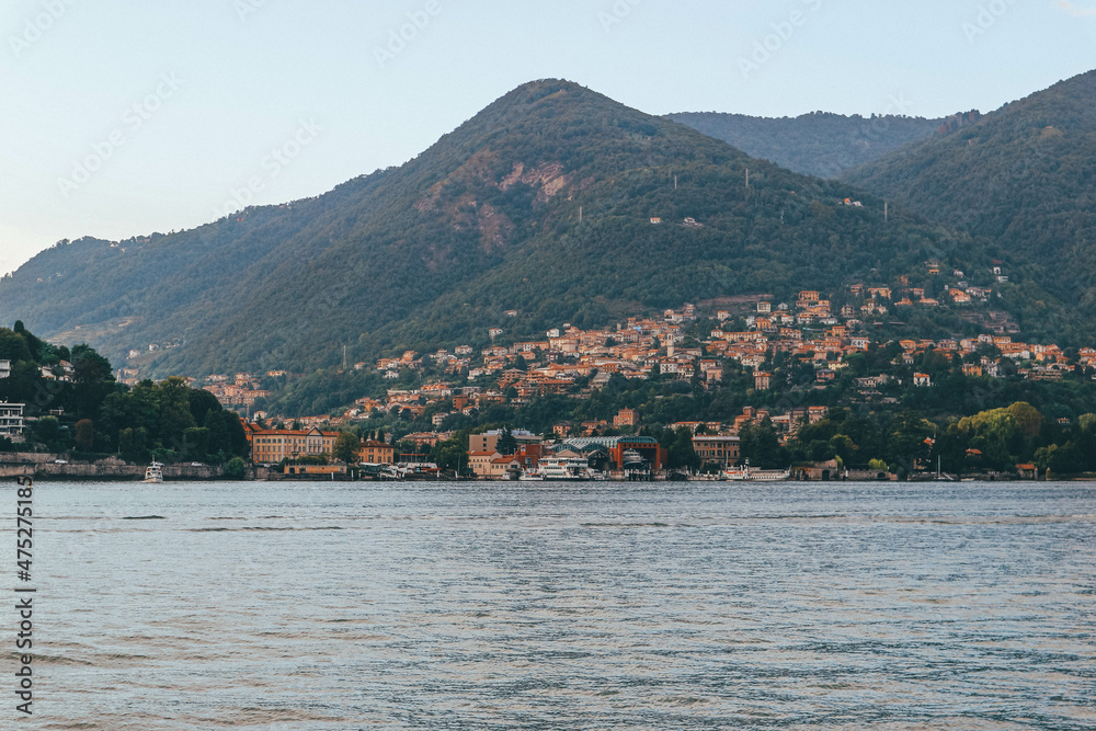 Panoramic view of small charming towns by the lake shore in northern Italy 