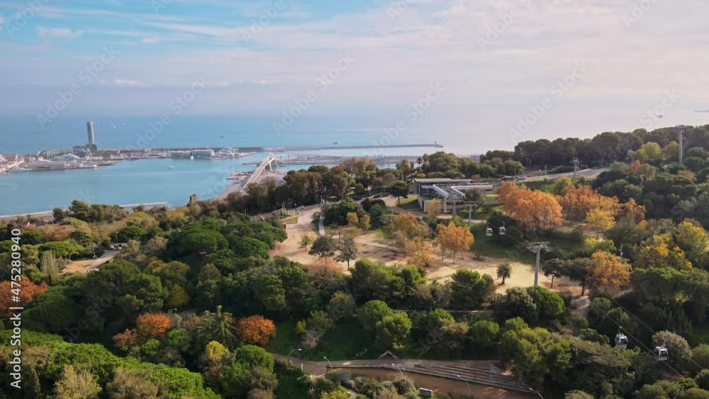 Aerial drone view of Barcelona city sea coastline with port. Sunny day. Montjuic district. Spain Aerial drone view of Barcelona city sea coastline with port. Sunny day. Montjuic district. Spain