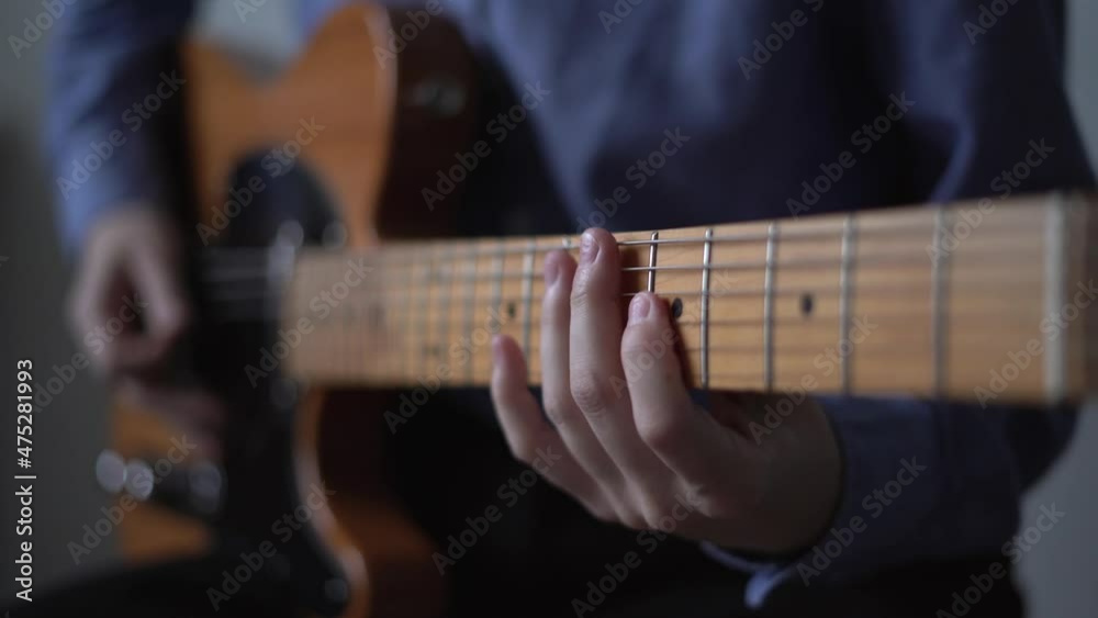Modern music producer with live instrument, guitar sample pack for your daw. Hit solo on electric guitar, distance music learning. Concept of home studio