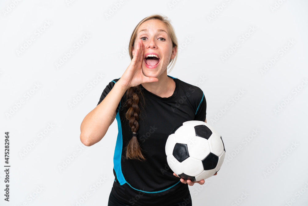 Young football player woman isolated on white background shouting with mouth wide open Young football player woman isolated on white background shouting with mouth wide open