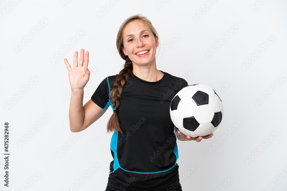 Young football player woman isolated on white background saluting with hand with happy expression Young football player woman isolated on white background saluting with hand with happy expression