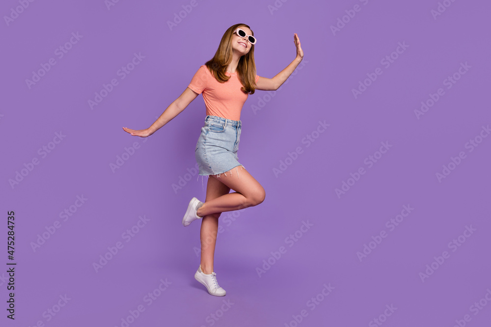 Full length body size view of attractive funky cheerful girl dancing having fun summertime isolated on shine violet purple color background