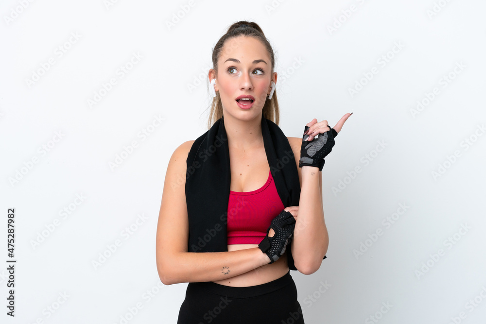 Young sport caucasian woman isolated on white background thinking an idea pointing the finger up